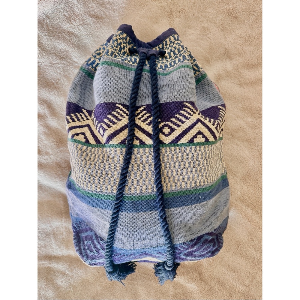 Blue Drawstring Backpack with Striped and Geometric Design